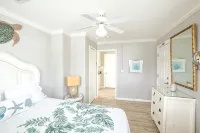 Salty Kisses Seaside Condo just steps to the beach and fishing pier