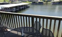 Cozy 1-bedroom condo in charming Village of Four Seasons with WiFi, fitness room - Homestays