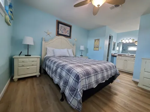Cozy Beach Condo with Private Beach, Heated Pool, High Speed WiFi, and More.