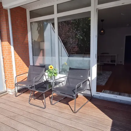 Modern city apartment with balcony and private parking space in a quiet location