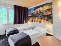 โรงแรม B&B ฟรังก์เฟิร์ตซิตี-ออสต์ โรงแรมใกล้ยูโรทาวเวอร์