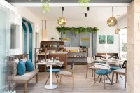 Elle Rooms & Suites - breakfast