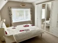 Lovely Bournemouth cottage with beautiful garden, walking distance to the beach - บังกะโล