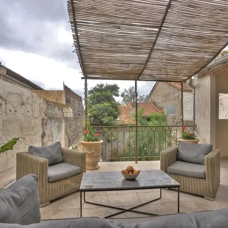 South-facing suite with terrace in town center