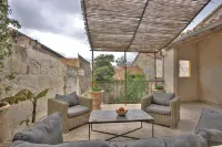 South-facing suite with terrace in town center