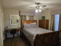 "Abbie's Place: Spacious 4Br Sanctuary with Sunroom and Private Backyard"