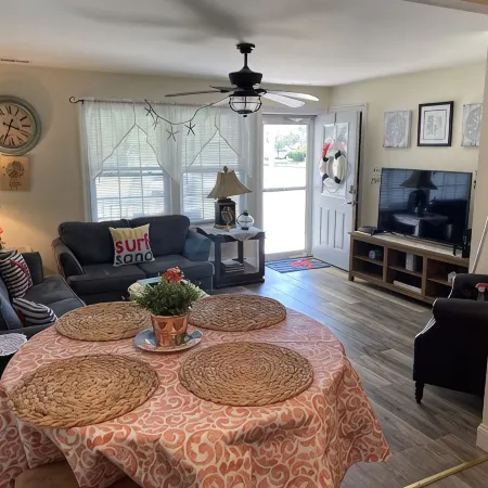 Beautiful corner property with cozy beach vibe.