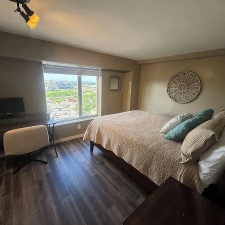 2B-2B centrally located in Omaha with skyline balcony views.