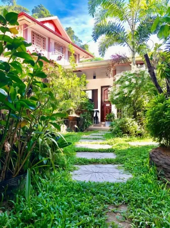 Hidden Garden Pension Отели рядом с достопримечательностью «El NIDO harbour - Cadlao Island view»