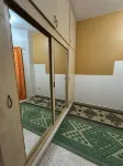Built-in cabinet room with balcony
