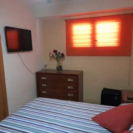 Beachfront apartment 40 k. from Valencia, services all year round, Отели в г. Кульера