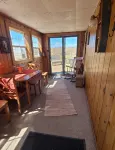 Charming 2-bedroom cottage with WiFi, AC on a peaceful Harsens Island canal. - Homestays
