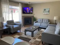 Entire Home in Edmonton South close to Airport with fenced private yard & deck