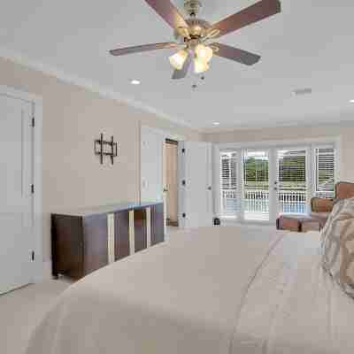 Steps from the beach, heated pool, and ocean sunrises from your patio Rooms
