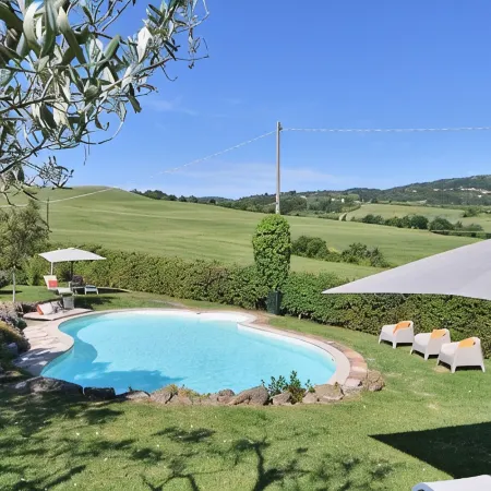 Charming villa in Chianni,Pool,garden, A/C, Pergola for al fresco dining,sleep 9