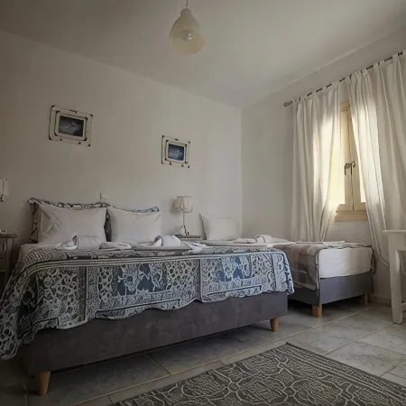 THEROS CASA LOGARAS