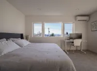 Steps to Alki Beach with Water Views Rooftop deck
