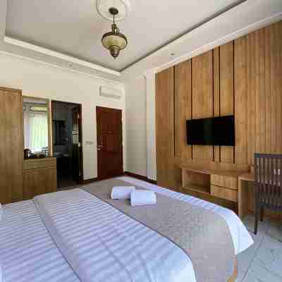 Toba Retreat Mansion and Villas Rooms