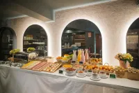 โมโต้ บาย ฮิลตัน คุสโก