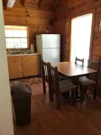 Cozy Cabin in the Woods in a Relaxing Area with Wrap Around Porch Rocking Chairs