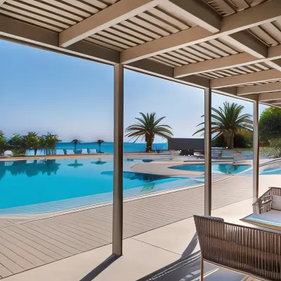 The Bay Hotel & Suites Hotels near Vrahos Beach