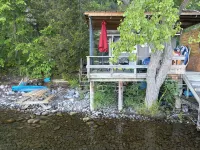 Waterfront retreat on 7 private wooded acres with beautiful sunset views. - 4-Star