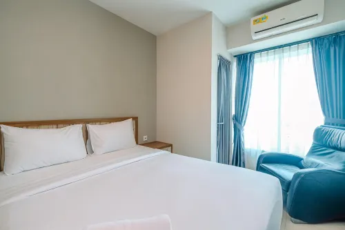 Comfy Design Studio at Grand Kamala Lagoon Apartment by Travelio