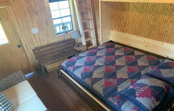 Big Mike's Cabin on the lake, next to ball diamonds nestled in 3 -cabin village