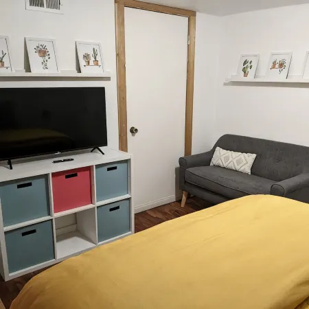 Lovely basement apartment with covered outdoor patio.