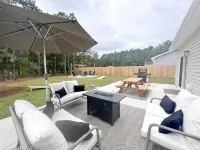 Coastal Retreat 10 Minutes to Beach w/ King Bed, Grill, Fire Pit & Game Room - 4-Star