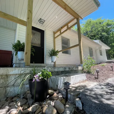 Lakefront home on the main channel w/ beautiful view and a boat ramp next door!