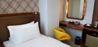 One Central Hotel & Suites
