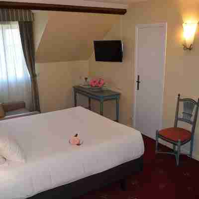 Logis Hôtel le Cheval Blanc Rooms
