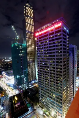 City Garden Grand Hotel Hotel in zona PBCom Tower