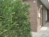 Holiday home in a quiet location in the center of Nordseebad Tossens Hotels in Tossens