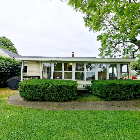 Johnson Homestead. One level living, ocean view with semi-private beach access.