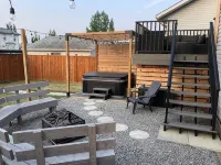 Cheerful, cozy 4 bedroom house w/ hot tub and firepit area Hotels in Red Deer