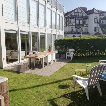 Modern duplex apartment, ground floor with garden within walking distance of the sea