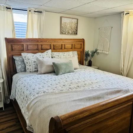 Spacious 4-bedroom house in Great Bend, KS with, Backyard Deck, Ping Pong Table