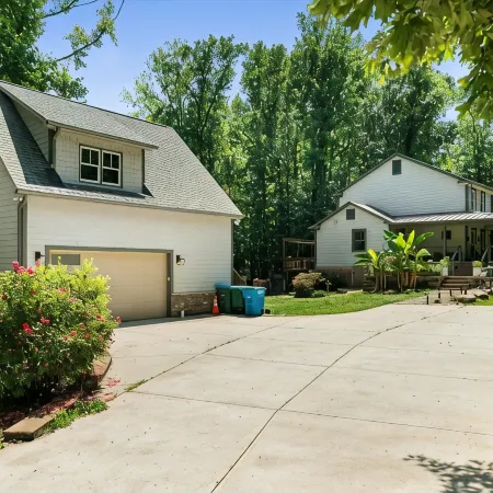 Studio above a detached garage away from main house on a private lot.
