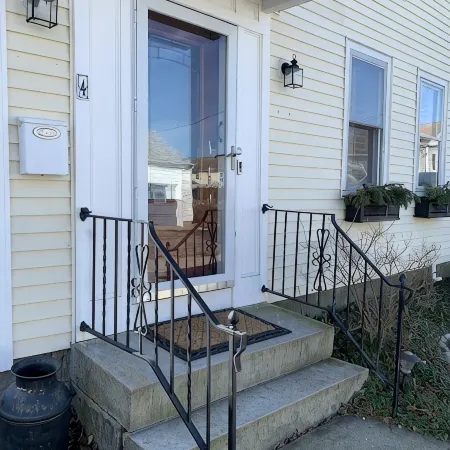 Exceptional location footsteps to beautiful downtown Mystic w/private driveway