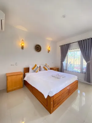 TRYTAN HOMESTAY Hotel di Mertak