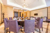Qicai Hotel - فطور