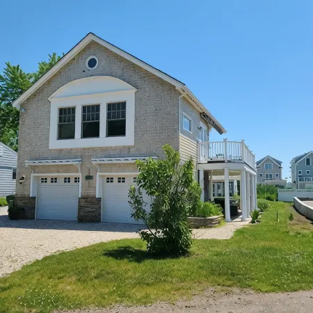 Beach House steps to private beaches in sought after location!