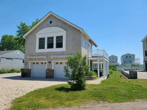 Beach House steps to private beaches in sought after location!