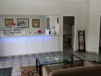 O Executive Inn & Suites 庫埃羅87號公路飯店 德威特縣住宿飯店