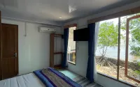 Omah Alchy Cottages - balcony