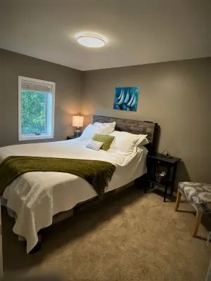 Cozy Black River Cottage with Private Dock and Boat Hoist-Sleeps 6 - Wi-Fi