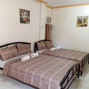 Dmc Caralos Vacation Inn and Dormitory