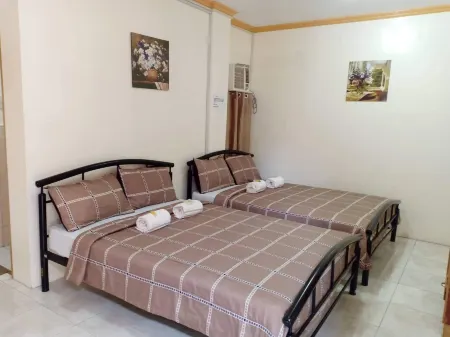 Dmc Caralos Vacation Inn and Dormitory